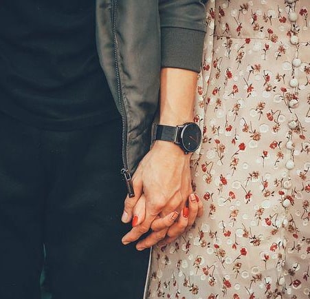 Couple holding hands images